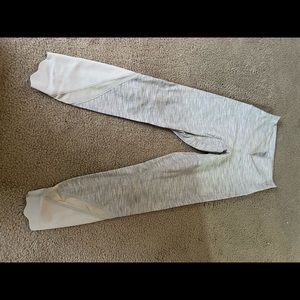 Lululemon leggings grey &white with mesh sides, size 2.